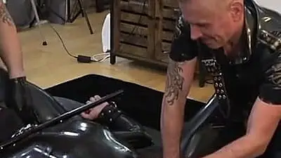 Rubber Gimp Bound and Used by Two Latex Guys Part 1