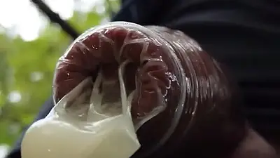 Boy Walks with Cum Filled Condom on His Uncut Dick After Fuck Outdoor