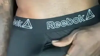BBC in grey underwear strokes cock until he explodes on his hands
